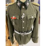 Militaria: Third Reich Waffen SS Oberstgruppenfuher M36 pattern Officers Combat Tunic. Museum