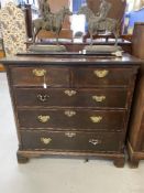 George III mahogany chest of two short and three long drawers with cock beading, canted side and