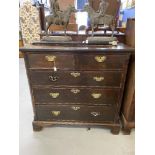 George III mahogany chest of two short and three long drawers with cock beading, canted side and