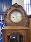 Clocks: Late 19th/early 20th cent. German oak three chain longcase clock. 11ins silvered dial with