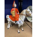 Beswick: Mounted life guard Arthur Gredington produced 1959/1977. The life guard is mounted on a