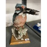 20th cent. Ceramics: G. Armani Capo-di-monte figure of a kingfisher holding a fish, perched on a