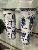 20th cent. Chinese cylinder vases with flared rim, blue decoration depicting scholars. Four