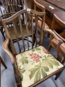 Early 19th cent. Oak elbow chair fluted stick back drop in padded seat tapering supports, 'H'