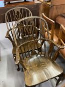 20th cent. dark stained hardwood Windsor spindle/splat back chairs with crinoline stretchers - a