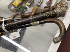 Walking Sticks: Late 19th/early 20th cent. Collection of four one with inset bone and white metal