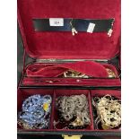 Costume Jewellery: Seven necklets, three bracelets, rings and earrings, all in a jewellery case.