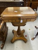 Victorian rosewood work table on a pedestal and triform base. Approx. 22½ins.
