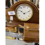 Scientific/Mechanical Instruments: Swiss made satinwood mantel clock with brass pillars and inlay,