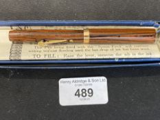 Pens: Waterman's "Ideal" women's purse pen, brown bark body, gilt fittings and nib, self filling