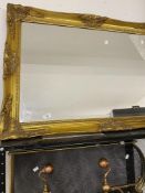 20th cent. Gilt bevel edge mirror plus a selection of fire irons and a screen.