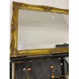 20th cent. Gilt bevel edge mirror plus a selection of fire irons and a screen.