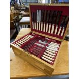 20th cent. Oak cased canteen of cutlery with drawer beneath.