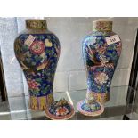 19th cent. Cantonese baluster shaped vases and covers, blue ground and multicoloured enamels