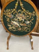 Edwardian Sheraton style oval fire screen with tapestry panel on shaped supports, approx. 20ins.