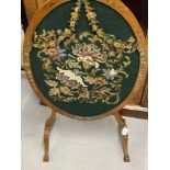 Edwardian Sheraton style oval fire screen with tapestry panel on shaped supports, approx. 20ins.