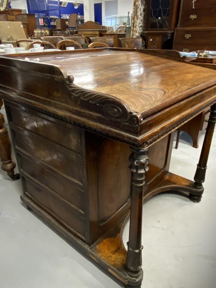 19th cent. Good quality rosewood davenport with fitted interior, adjustable top, and drawers to