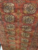 Carpets & Rugs: Two early 20th cent. Turkish rugs/runners. Runner red ground, thirty two Guls, two