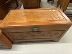 20th cent. Chinese hardwood chest the panels carved with bamboo relief on step bracket supports.