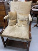 19th cent. Mahogany gentleman's armchair with extending footrest.