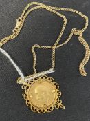 Jewellery: 9ct. Gold necklet, trace link chain having a 9ct. Gold pendant attached mounted with a