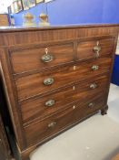 Early 19th century mahogany chest of two short and three long drawers, inlaid escutcheon's, on