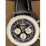 Watches: Breitling Navitimer GMT 46 black watch with leather strap. Sold with presentation box,
