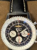 Watches: Breitling Navitimer GMT 46 black watch with leather strap. Sold with presentation box,