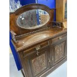 19th cent. Mahogany mirrored sideboard, two drawers over two doors which are decorated with stylised