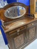 19th cent. Mahogany mirrored sideboard, two drawers over two doors which are decorated with stylised