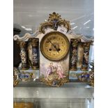 Clocks: Early 20th cent. French ceramic mantle clock with cloisonne columns and inset decoration.