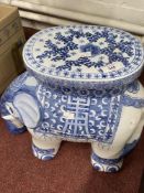 20th cent. Ceramic blue/white conservatory seat in the form of an elephant.