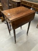 19th cent. Rosewood hall table with drop leaf sides and twin drawers on turned supports