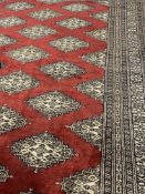 Carpets & Rugs: 20th cent. North Persian deep red ground with 20 full guls & 14 half guls. Fifteen