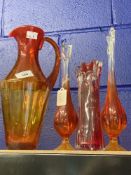 Red Art Glass: Tall decanter, two slender vases, plus one other.