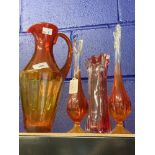 Red Art Glass: Tall decanter, two slender vases, plus one other.