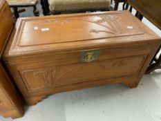 20th cent. Chinese hardwood chest the panels carved with bamboo relief on step bracket supports.