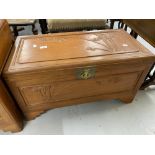 20th cent. Chinese hardwood chest the panels carved with bamboo relief on step bracket supports.