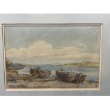 19th cent. English School: Fishing vessels moored on the bank, monogrammed SFE. 14in. x 10in.