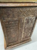 18th/19th cent. French walnut buffet with heavily carved panels depicting folk scenes. 61in.