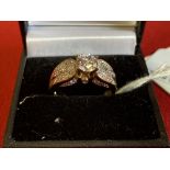 Jewellery: Yellow metal ring set with cubic zirconian, tests as 9ct. gold. Weight 4·4g.