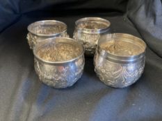Hallmarked Victorian Silver: Four embossed bowls, three with leaf and floral decoration, and one