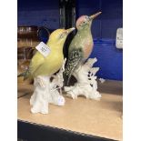 20th cent. Ceramics: Karl Ens bird ornaments Golden Oriel on tree stump. 7½ins. Green Woodpecker
