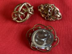 19th cent. Yellow metal mourning brooch, plus two other brooches.