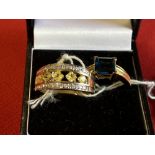 Jewellery: Yellow metal two rings one set with yellow sapphires and diamonds and one set with a blue