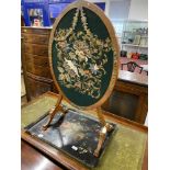 Edwardian Sheraton style oval fire screen with tapestry panel on shaped supports, approx. 20in.