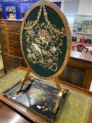 Edwardian Sheraton style oval fire screen with tapestry panel on shaped supports, approx. 20in.