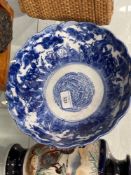 Early 20th cent. Japanese blue and white bowl depicting children playing in a garden with fluted