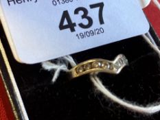 Diamond wishbone ring set with nine brilliant cut stones, estimated weight 0·35ct. stamped and