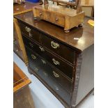 George III mahogany chest of two short and three long drawers with cock beading, canted side and